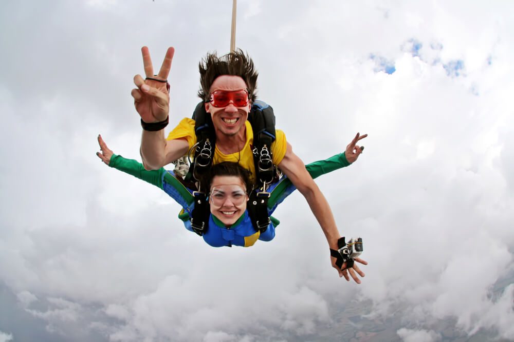 Two people skydiving in Key West.